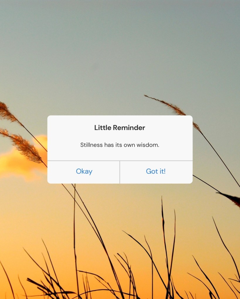 A phone-style reminder pop-up reads, “Stillness has its own wisdom,” against a sunset sky with silhouetted grass stems.